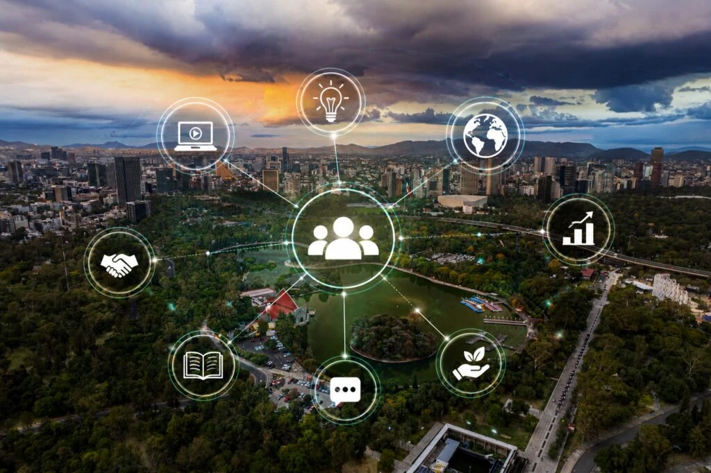Vista aérea de la Ciudad de México con una red digital superpuesta que conecta personas, conocimiento y oportunidades de colaboración en temas de sostenibilidad.